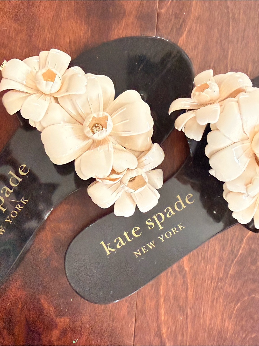 Sandal with floral embellishments